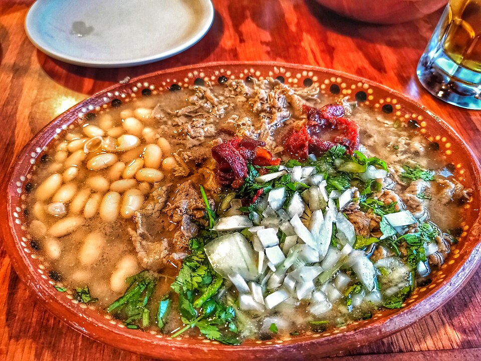 Carne en su jugo, diced beef in broth with beans and bacon
