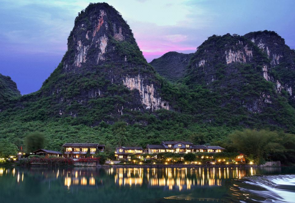 Yangshuo Mountain Retreat (อิงท่งกุ้ยหลิน · 阳朔胜地酒店)