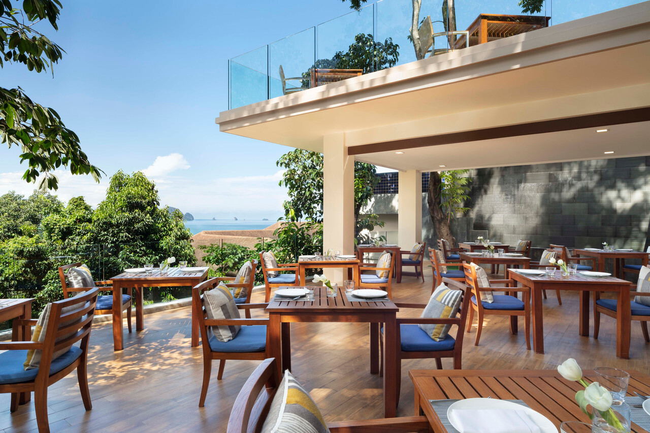 The Cliff open-air restaurant overlooking the sea and karsts