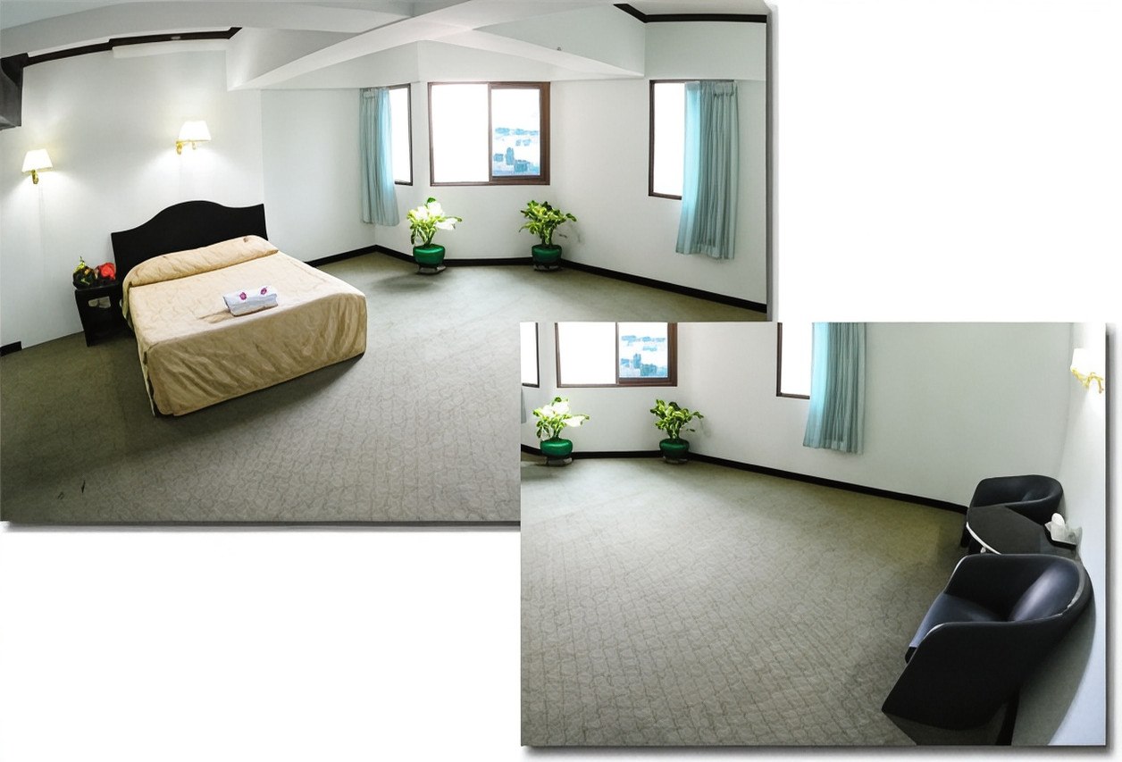 Spacious Whale Suite with a seating area set apart from the bed