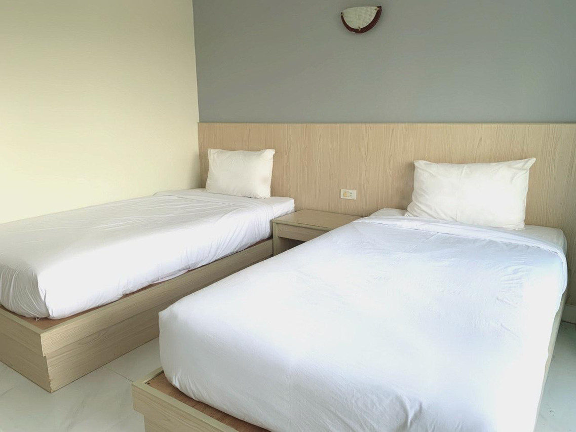 ห้องเตียงคู่ Superior Twin โทนสว่าง สะอาด Grand PL Hotel พัทลุง