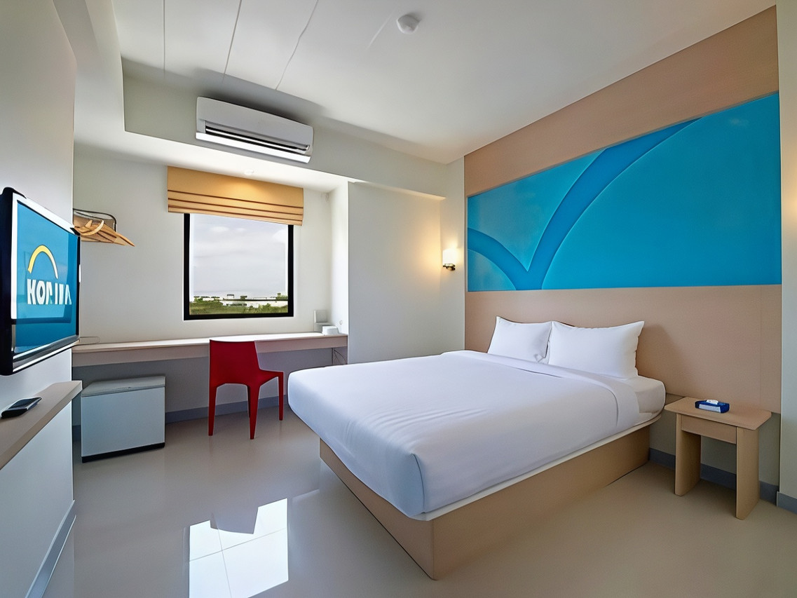 ห้อง Standard Double ของ Hop Inn Sakon Nakhon มองเห็นทุ่งนานอกหน้าต่าง