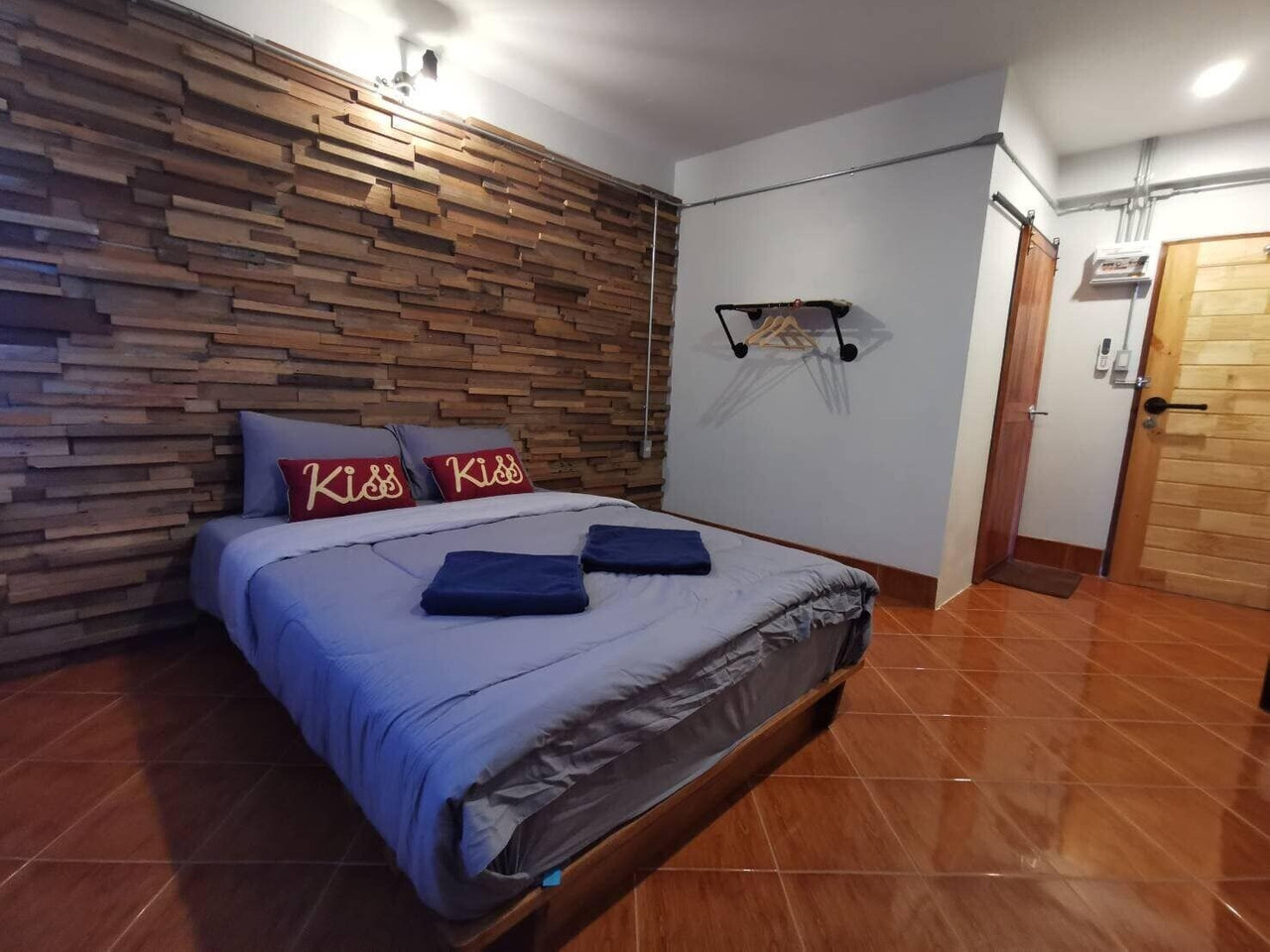 Design Double room with wood-panel wall and tiled floor at Pakarang Resort, Pak Bara, Satun