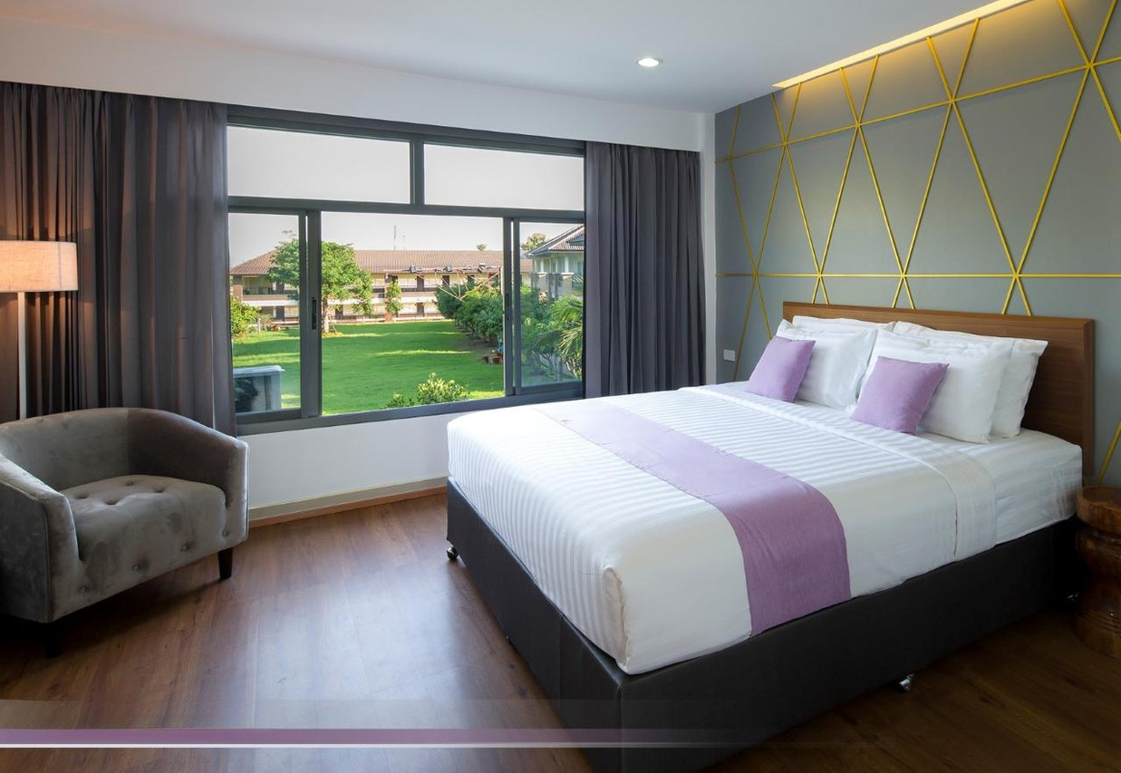ห้องพักวิลล่า Araya Hotel เตียง King วิวสวนสีเขียว